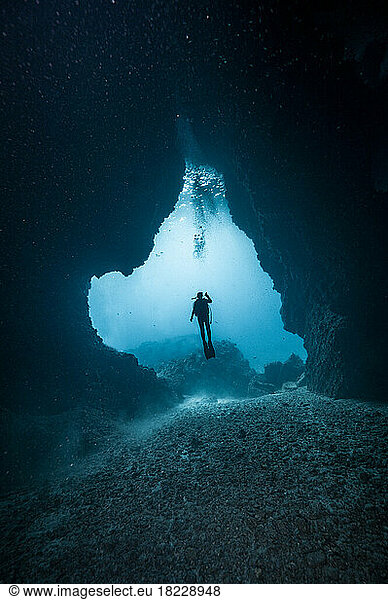 diver exploring underwater cave in the South Andaman Sea