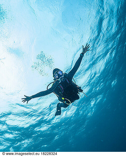 diver floating the South Andaman Sea in Thailand