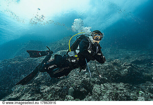 diver in the tropical waters of the Andaman Sea in Thailand