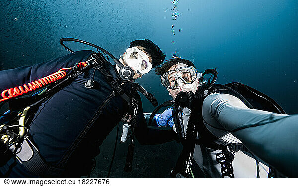 divers taking selfie during a dive at the gulf of Thailand