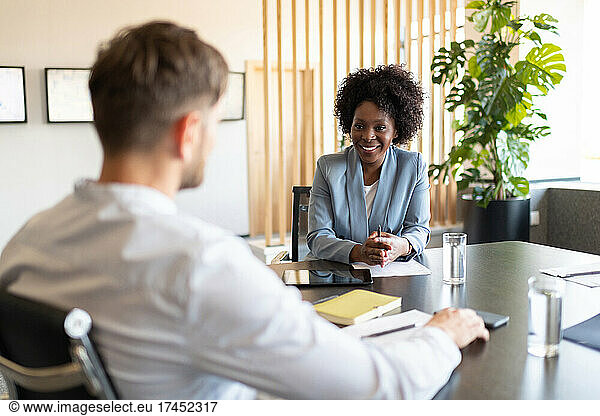 Diverse businesspeople talking during job interview