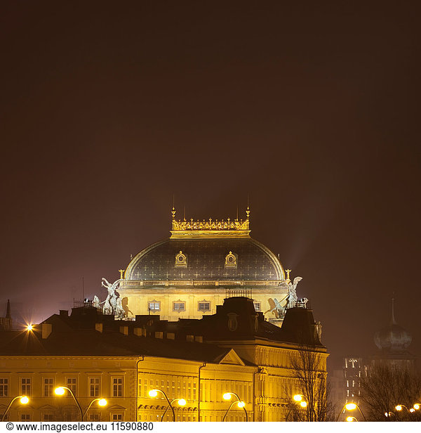 Dome and buildings lit up at night