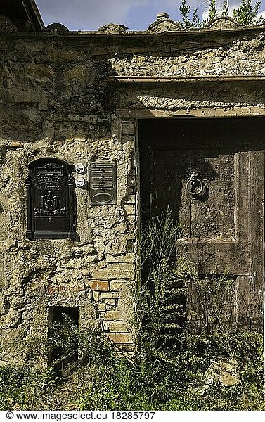 Doorway along narrow street  Volterra  Tuscany  Italy  Europe