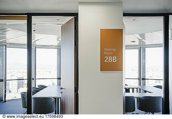 Doorways of empty board rooms in office