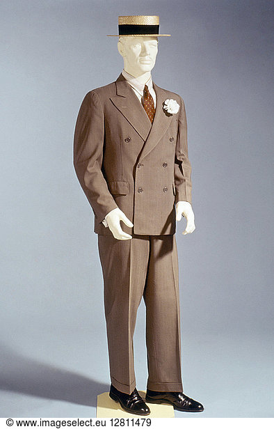 DOUBLE-BREASTED SUIT  1930. American ready-to-wear two-piece man's double breasted suit.