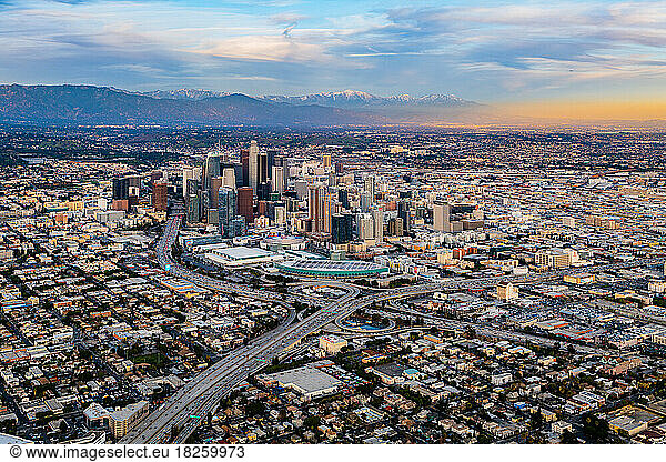 Downtown Los Angeles Snow Peaked Mountains Aerial Sunset