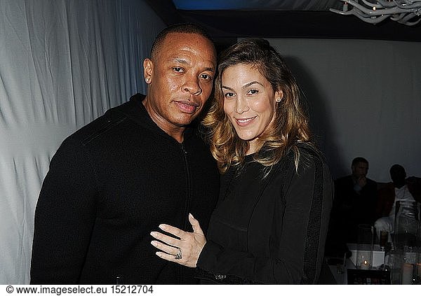 Dr. Dre and Nicole Threatt attend the Universal Music Group Chairman & CEO Lucian Grainge's annual Grammy Awards viewing party on February 10  2013 in Brentwood  California.