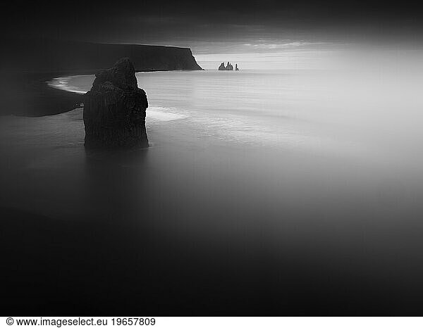 Dramatic black-sand beach Reynisfjara on Iceland.