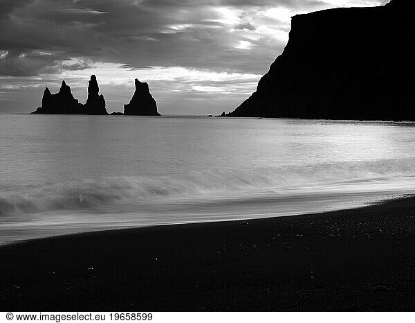 Dramatic black-sand beach Reynisfjara on Iceland.