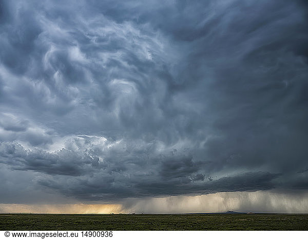 Dramatic skies over the landscape seen during a storm chasing tour in the midwest of the United States; Kansas  United States of America