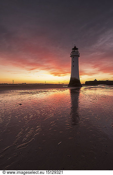 Dramatic sunrise at Perch Rock Lighthouse  New Brighton  Merseyside  The Wirral  England  United Kingdom  Europe