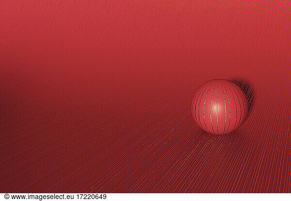 Dreidimensionales Rendering einer rot gestreiften Kugel vor rotem Hintergrund
