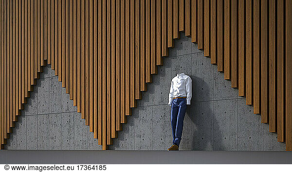 Dreidimensionales Rendering einer unsichtbaren Person  die sich an eine Beton- und Holzwand lehnt