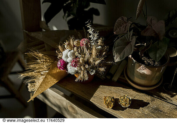 Dried flowers on table at home