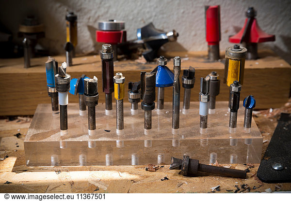 Drill bits in plastic block in workshop