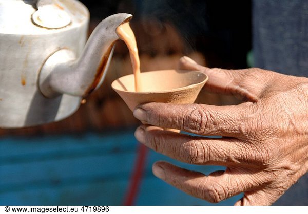 Drink   tea old system of drinking tea in earthen pot using hygienic purpose