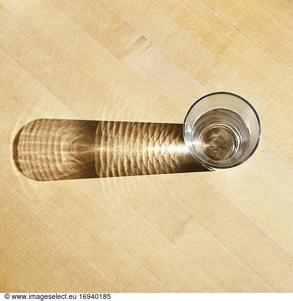 Drinking water in glass seen from above.