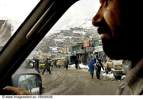 Driver in Kabul negotiates bad roads.