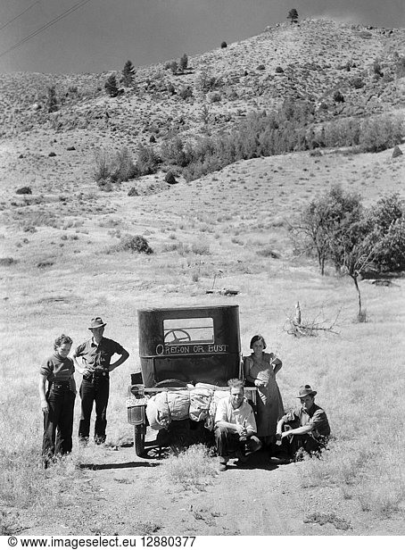 DROUGHT REFUGEES  1936. Vernon Evans and his family in Montana  en route from South Dakota to Oregon in search of work. Photograph by Arthur Rothstein  1936.