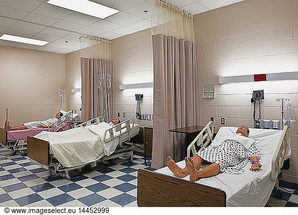 Dummy patients laying in hospital beds