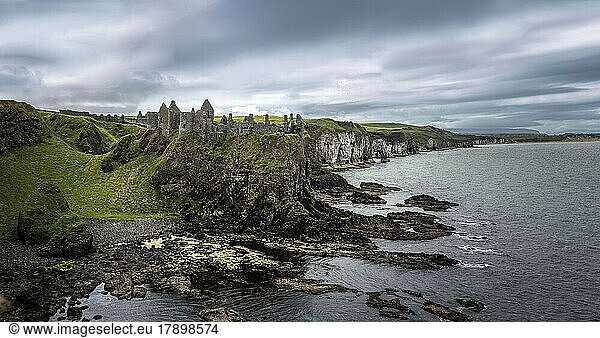 Dunluce Castle on cliff at coastline  Portrush  Northern Ireland