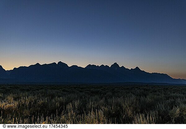 Dusk silhouettes in Grand Teton National Park  Wyoming.