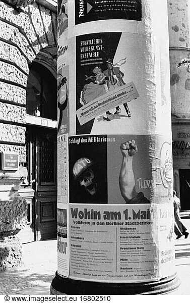 East Berlin / East Germany (GDR). Advertising column with propaganda poster on 1st May  with information on organized events. Photo  1957.