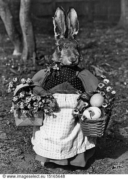 Easter  Easter Bunny with flowers and eggs in the basket  1960s