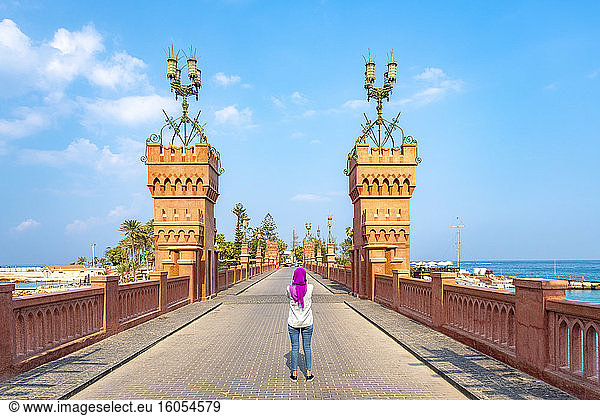 Egypt  Alexandria  Rear view of woman standing on Montaza bridge