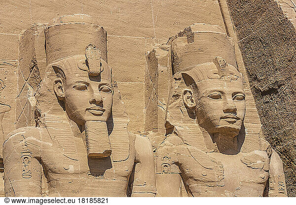 Egypt  Aswan Governorate  Giant statues at entrance of Great Temple of Rameses II