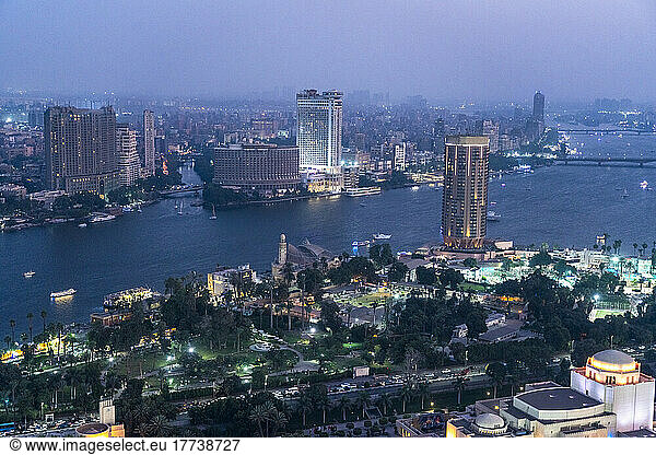 Egypt  Cairo  View of Gezira island at dusk with Cairo Opera House in foreground and river Nile in background