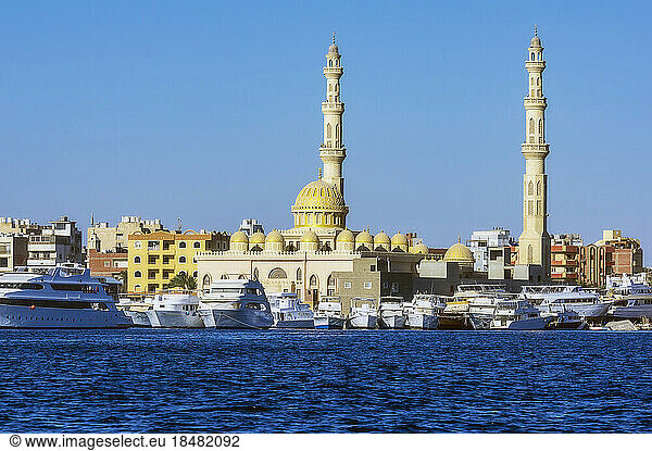 Egypt  Red Sea Governorate  Hurghada  Boats moored in front of El Mina Mosque