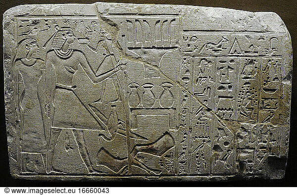 Egypt. Stela of Heqaib. 22nd-21st centuries BC. Heqaib and the wife before sacrificial altar and the small figure (sevant). Necropolis of Gemelein. First Intermediate Period  10th dynasty. The State Hermitage Museum. Saint Petersburg. Russia.