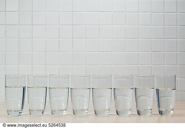 Eight glasses of mineral water