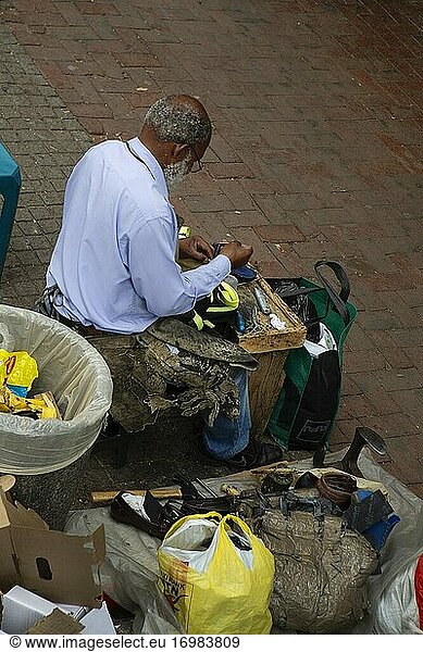 Elderly African male street tailor in Johannesburg  South Africa