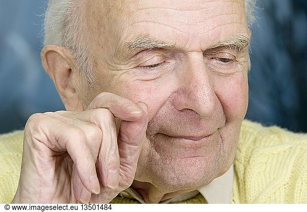 Elderly man having a conversation  grinning  Germany  Europe
