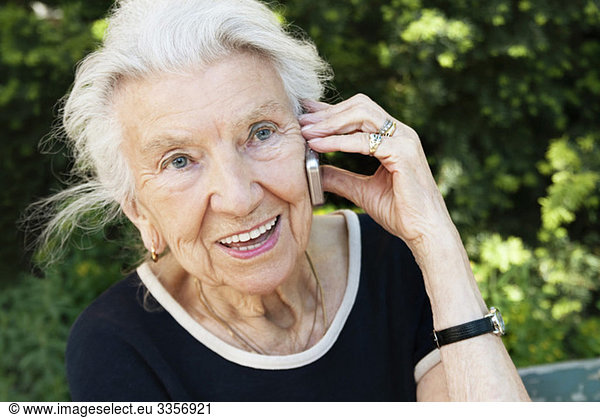 Elderly woman talking in phone