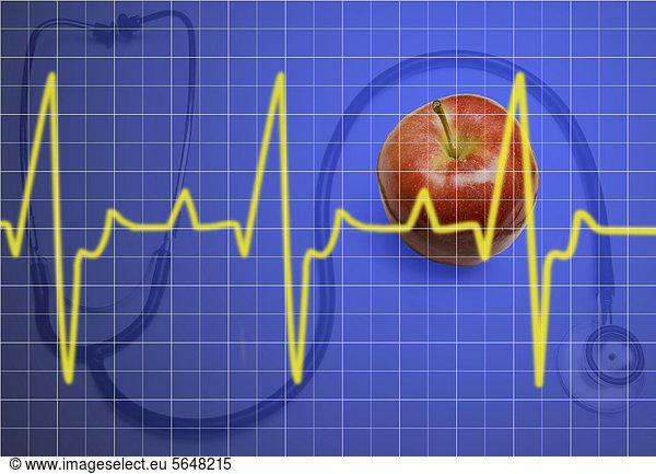 Electrocardiogram read out juxtaposed with stethoscope and apple  symbolic image for disease prevention  healthy diet and health care