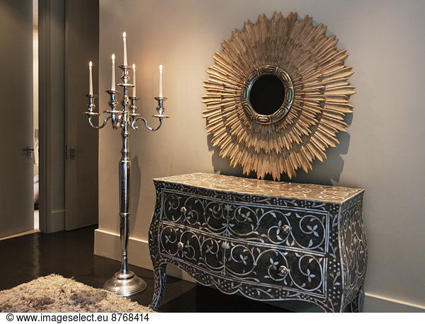 Elegant dresser  mirror and candelabra in luxury bedroom