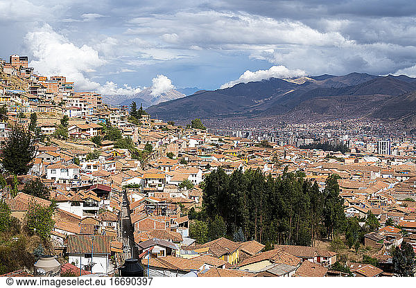 Elevated view of Cusco city with mountains in background  Peru