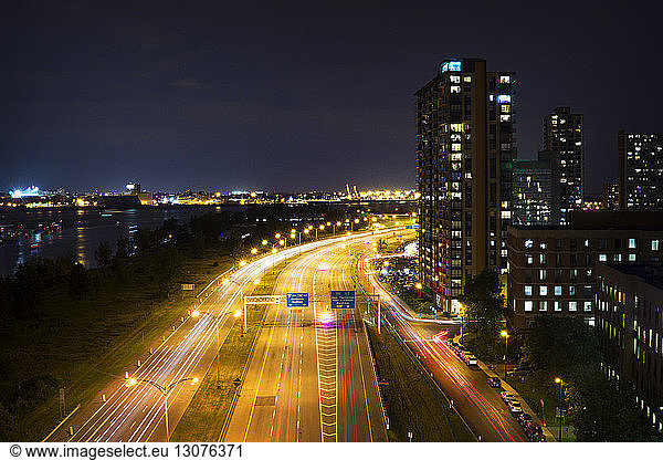 Elevated view of streets and office blocks at night