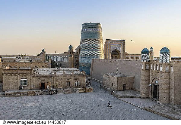 Elevated view over the courtyard of historic monuments with Kalta Minor minaret in the centre of Khiva  Uzbekistan.
