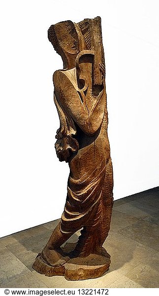 Elm wood sculpture titled "Orpheus" by Ossip Zadkine (1890-1967) a French sculptor  but also produced paintings and lithographs. Dated 1930