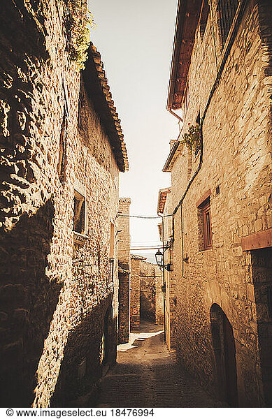 Empty alley amidst houses at Roda De Isabena  Spain