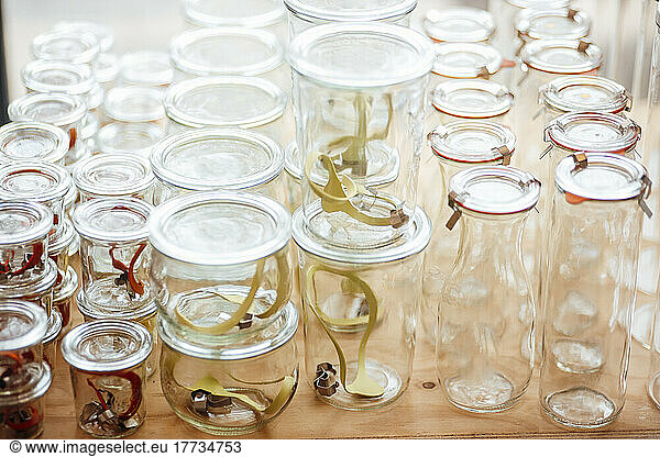 Empty glass containers on table at cafe