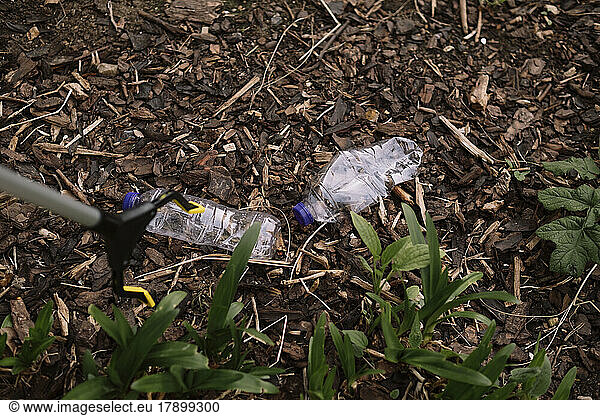 Empty plastic bottle litters in park