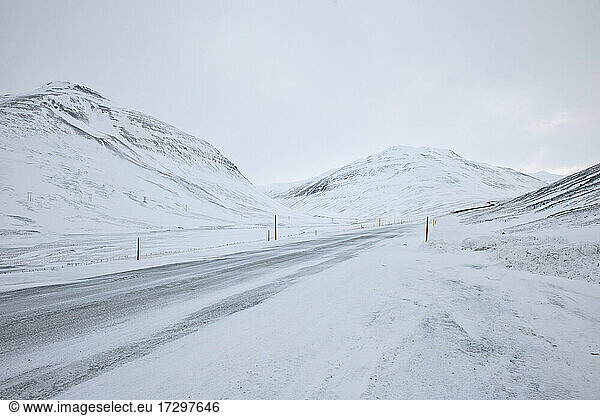 empty road on the Icelandic highlands during the winter