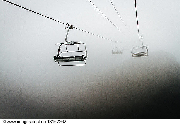 Empty ski lift in mist  Whistler  British Columbia  Canada