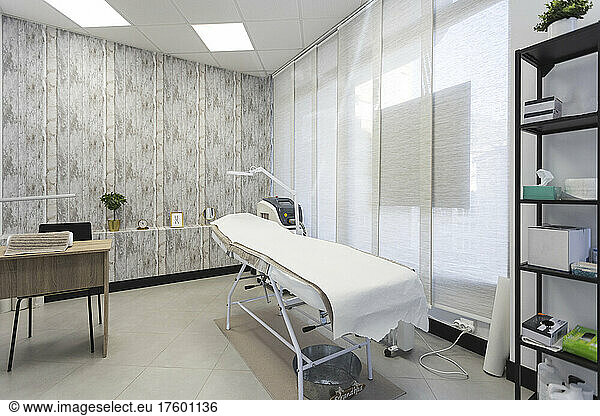 Empty skin care treatment room at aesthetic clinic