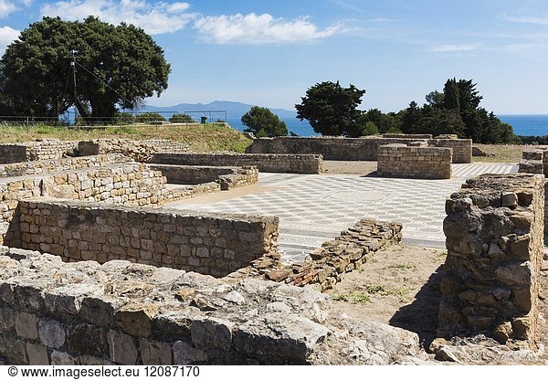 Empuries also known as Ampurias, Girona Province, Catalonia, Spain. In situ mosaic floor of Roman villa. Empuries was founded by the Greeks in the 6th century BC as a trading town and later became part of the Roman empire.